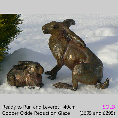 hare and leveret - raku fired ceramic hare sculpture by Lesley D McKenzie, art and animal sculpture