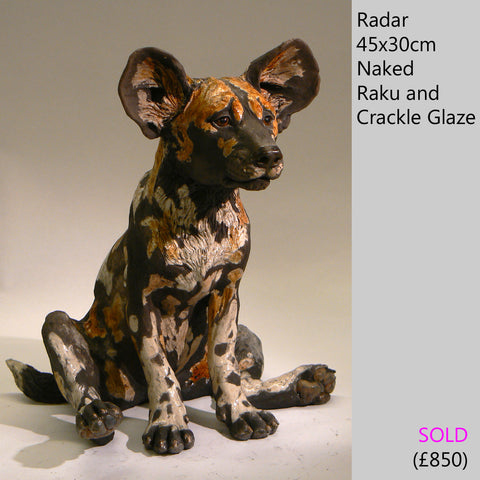 african wild dog sculpture