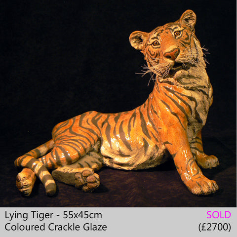 tiger sculpture big cat sculpture, raku fired ceramic sculpture by Lesley D McKenzie