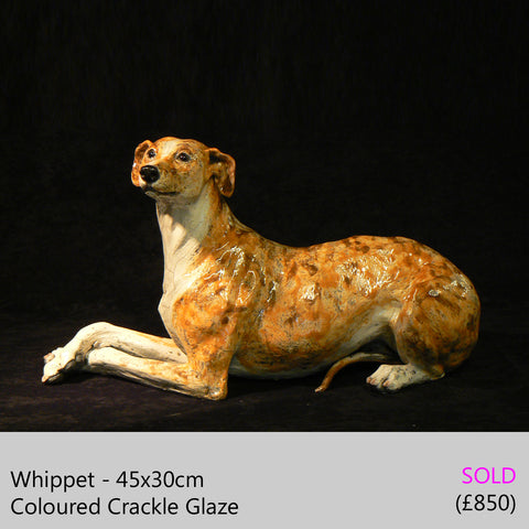 whippet dog sculpture, raku fired ceramic sculpture by Lesley D McKenzie