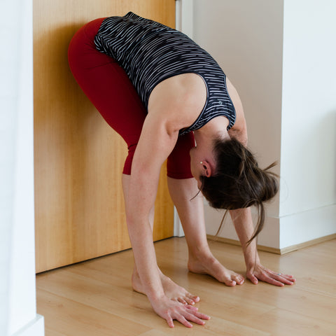Jasyoga stretches for runners forward fold at wall