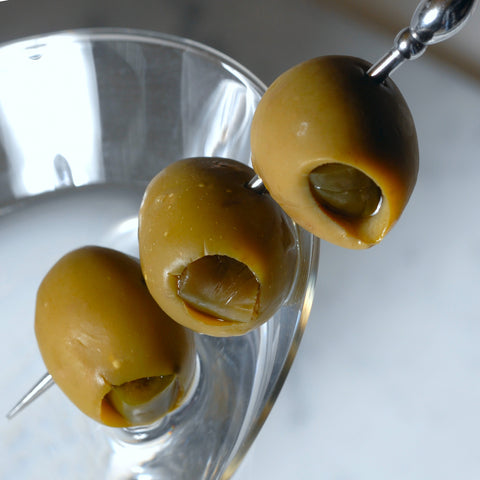 Speared jalapeno stuffed olives