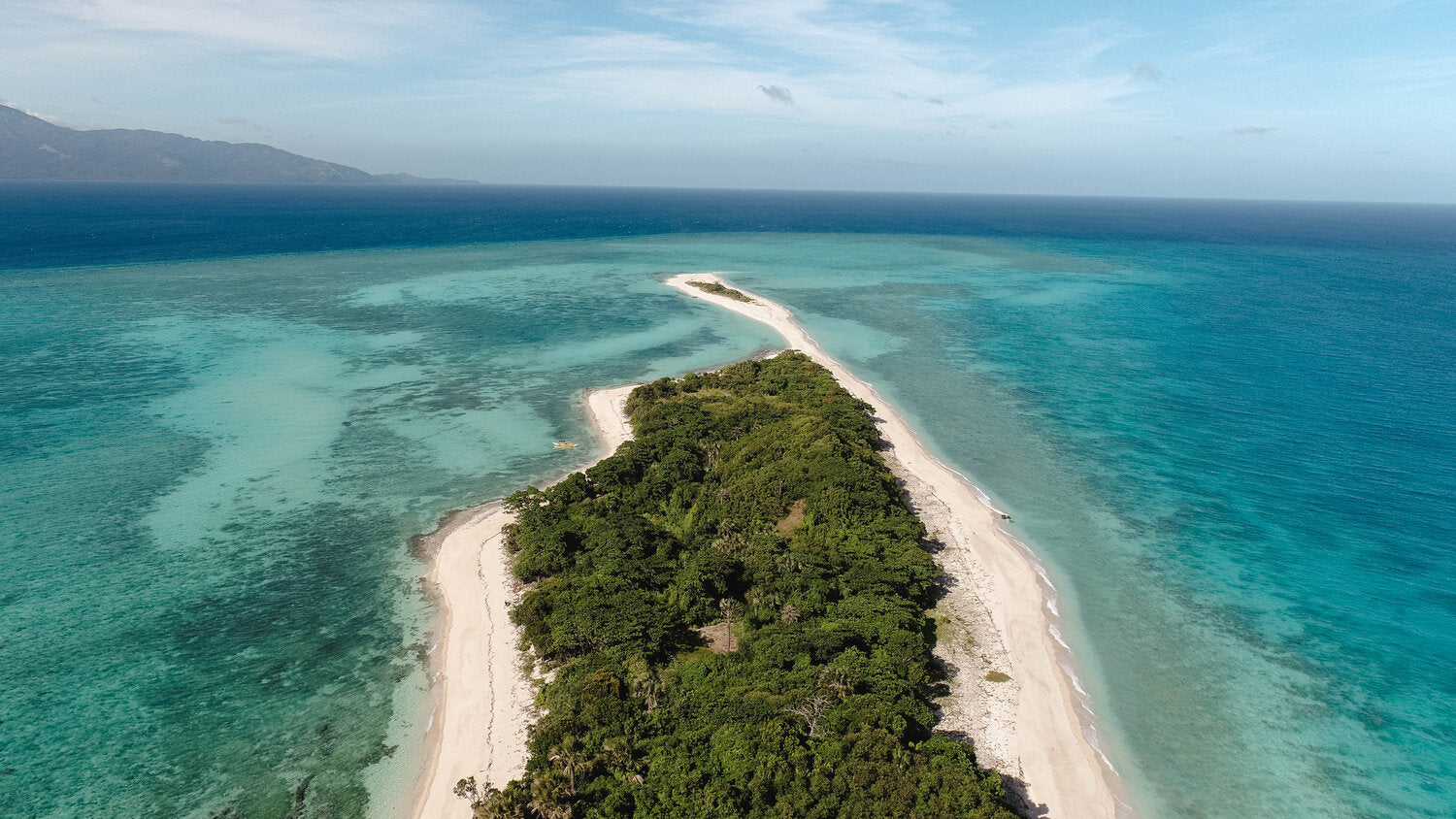 Drone shot of Cresta De Gallo, a Philippines Island