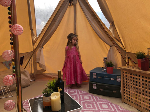 girl in bell tent