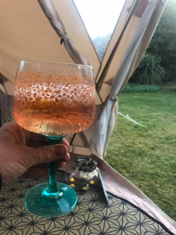 drinks inside a bell tent