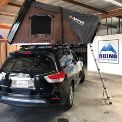 black Nissan Pathfinder with black iKamper Skycamp Roof Top Tent installed in San Diego CA