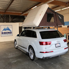 white ikamper roof top tent installation on white audi q7 in San Diego CA