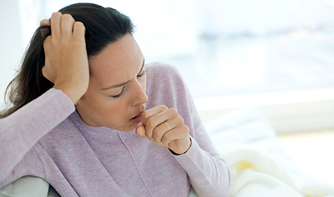 woman coughing