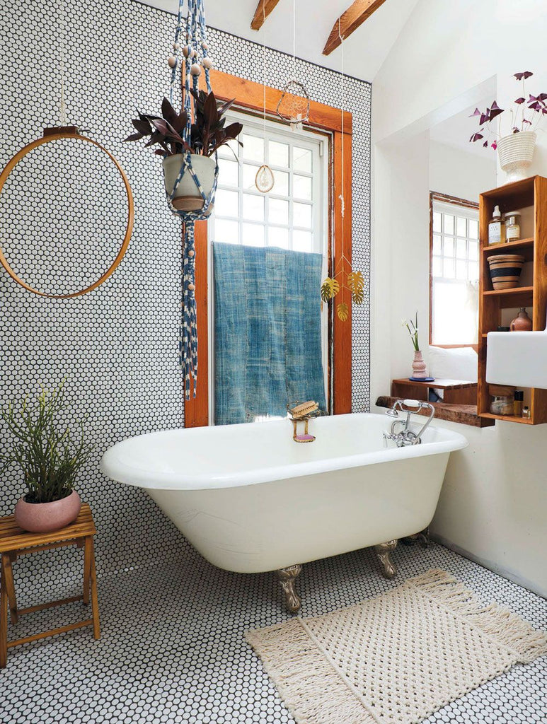 Artistic Bathroom with Curated Curtain haning from a Tension Rod