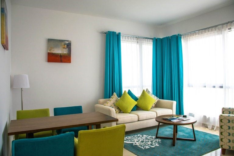 Living room with aqua curtains