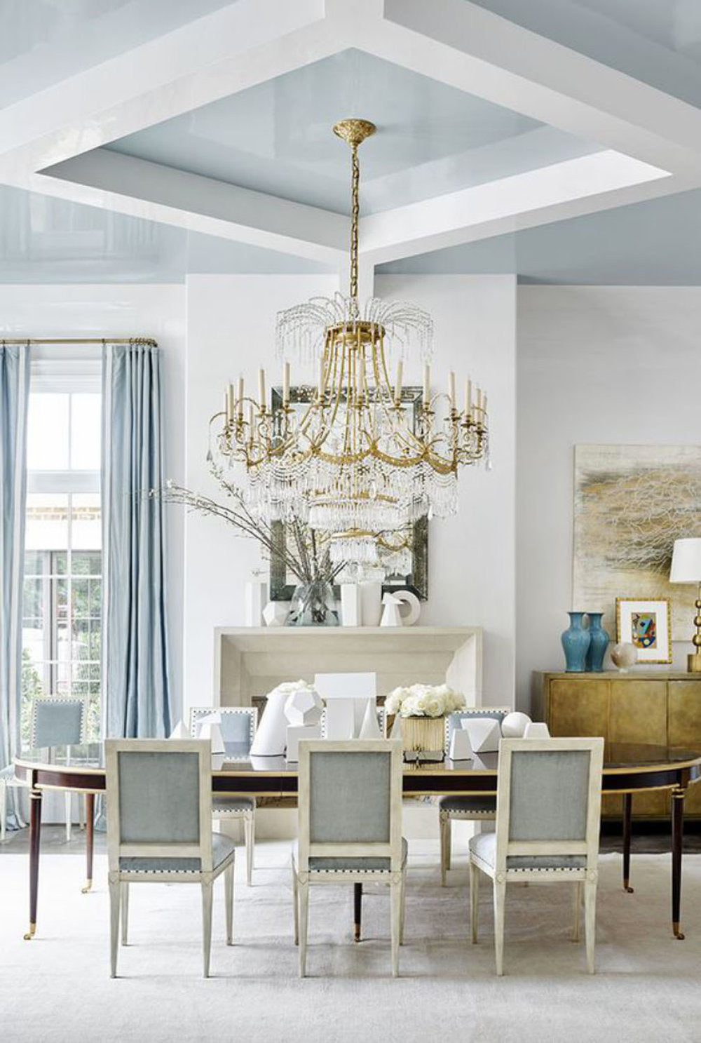 glamorous dining room with gold chandelier