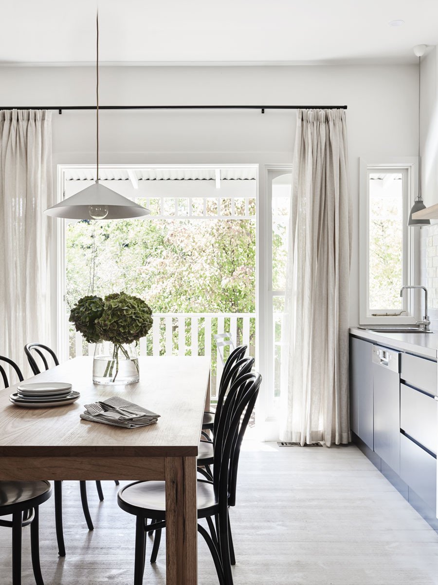 light linen curtains in a contemporary dining room