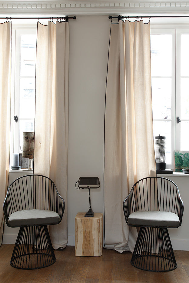 minimalist sitting corner with light curtains