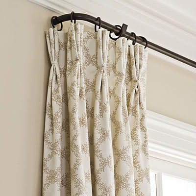 pinch pleated drapery panel with return