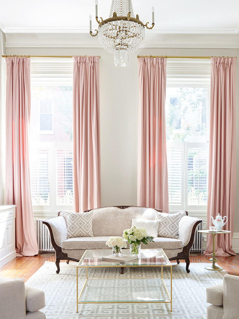 pink curtains in a light opulent living room