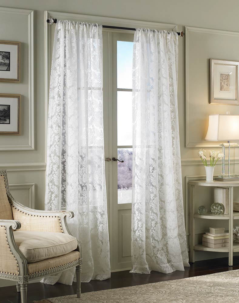 white lace curtains in chic sitting room