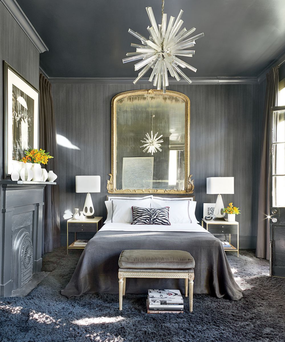 wrought iron drapery rod in a gray bedroom with animal print