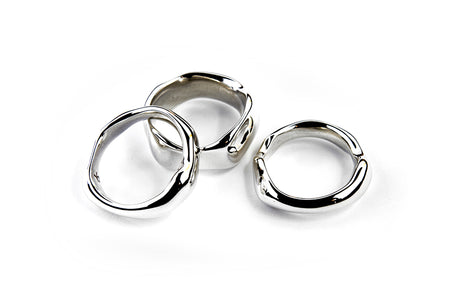 A set of 3 highly polished sterling silver free form Ice Rings