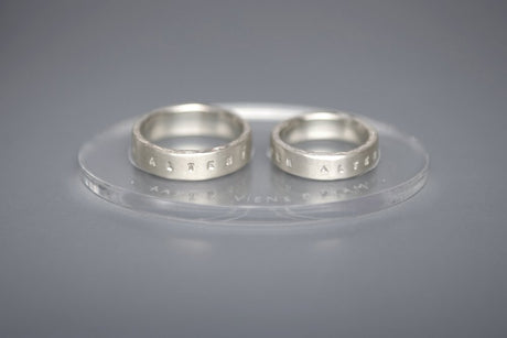Silver wedding rings with inscriptions in Latin