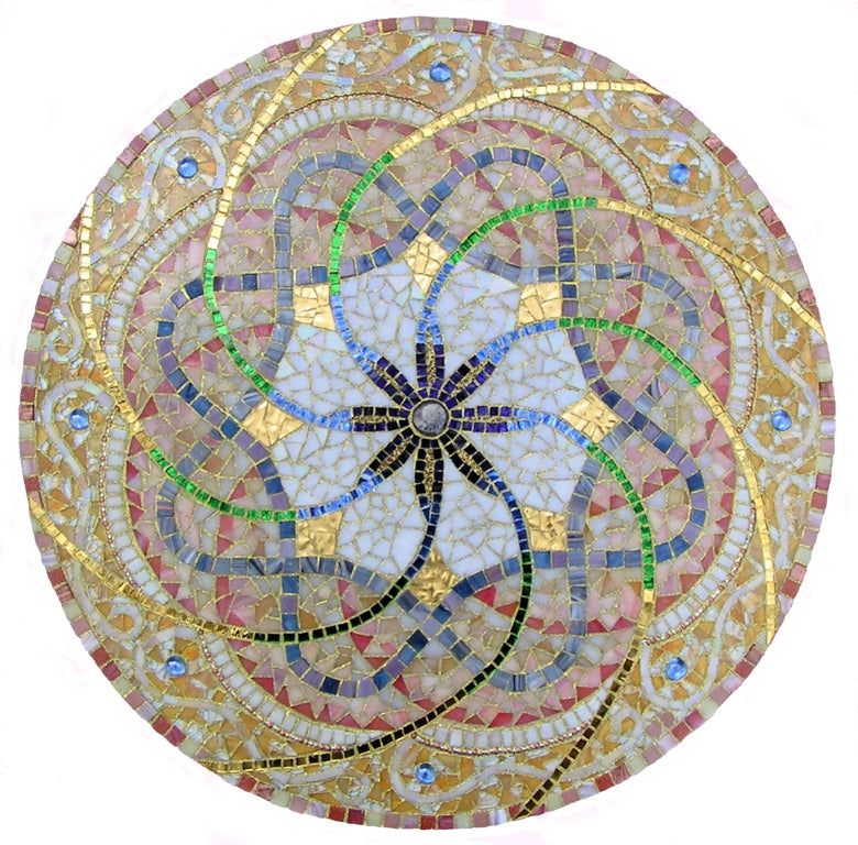 Light Swirls: 20” by Dianne Sonnenberg - mosaic mandala.  Ammonite, stained glass, glass tile, mirror, beads, 24K gold tile, and Spectralock Dazzle Grout.  Designed and created to express the awe I felt after being in the presence of Tibetan Monks creating a sand mandala.