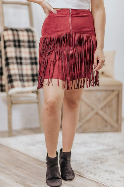 DELICATE LOVE SUEDE FRINGE ZIP UP MINI SKIRT IN BURGUNDY