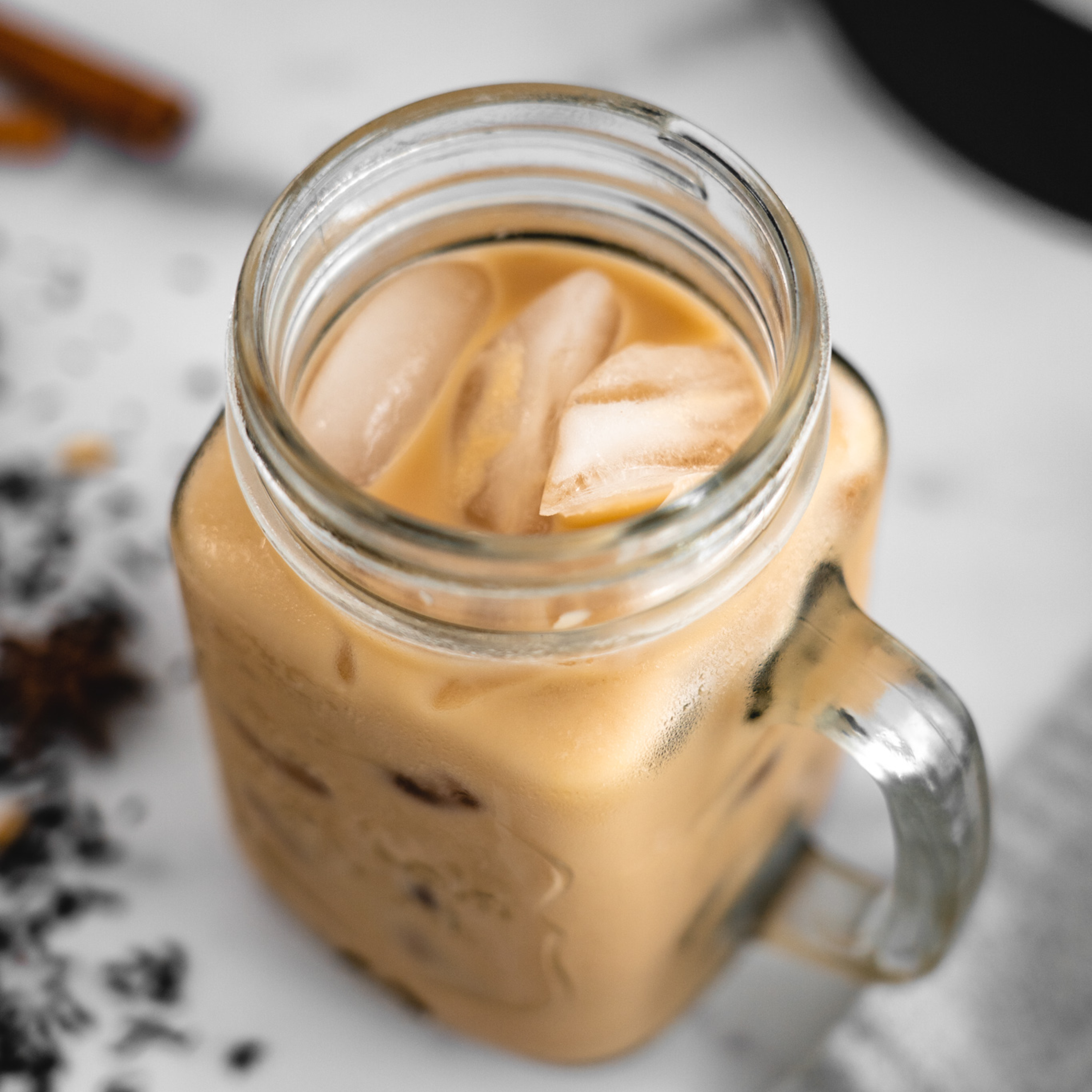 glass of plant-based cold brew chai milk