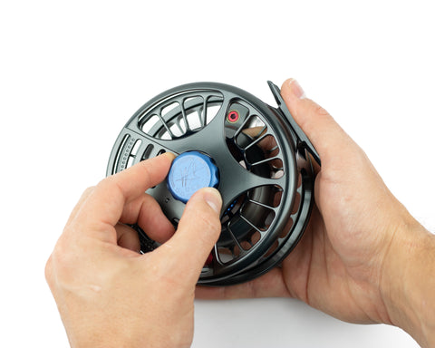 removing the drag dial for the saltwater fly reel. 