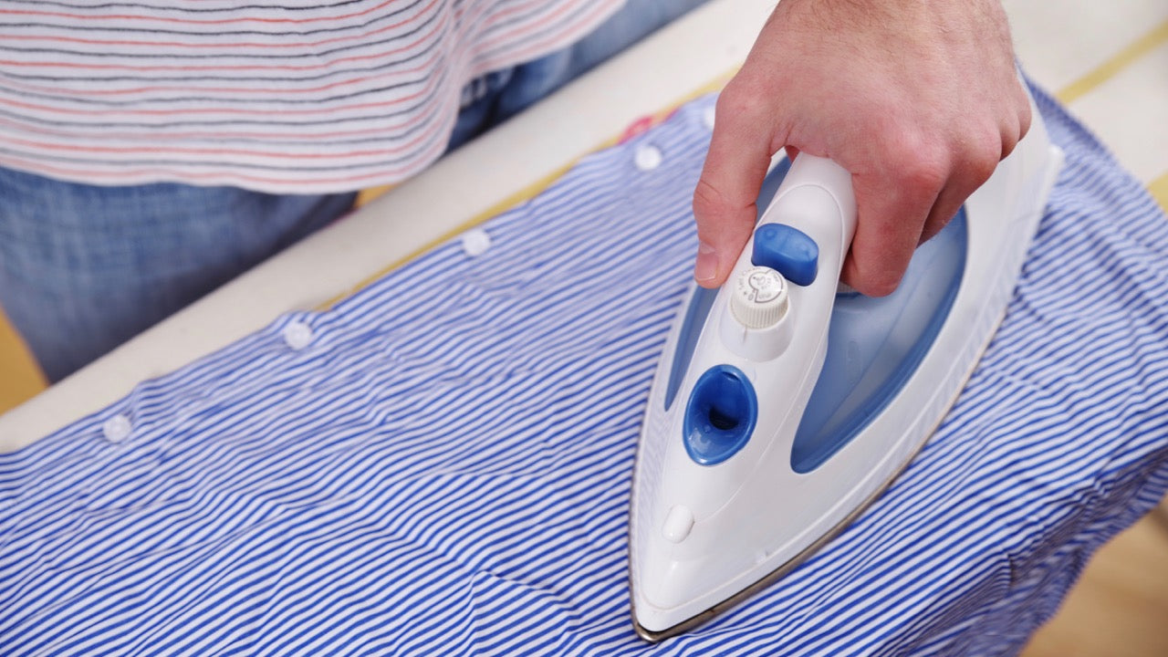 man-ironing-shirt