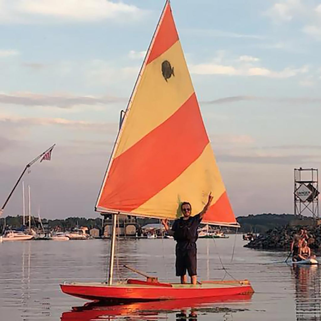 1967_retro_sunfish_sailboat_orange_and_yellow