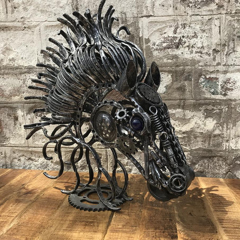 Using scrap metal to create a horse head sculpture