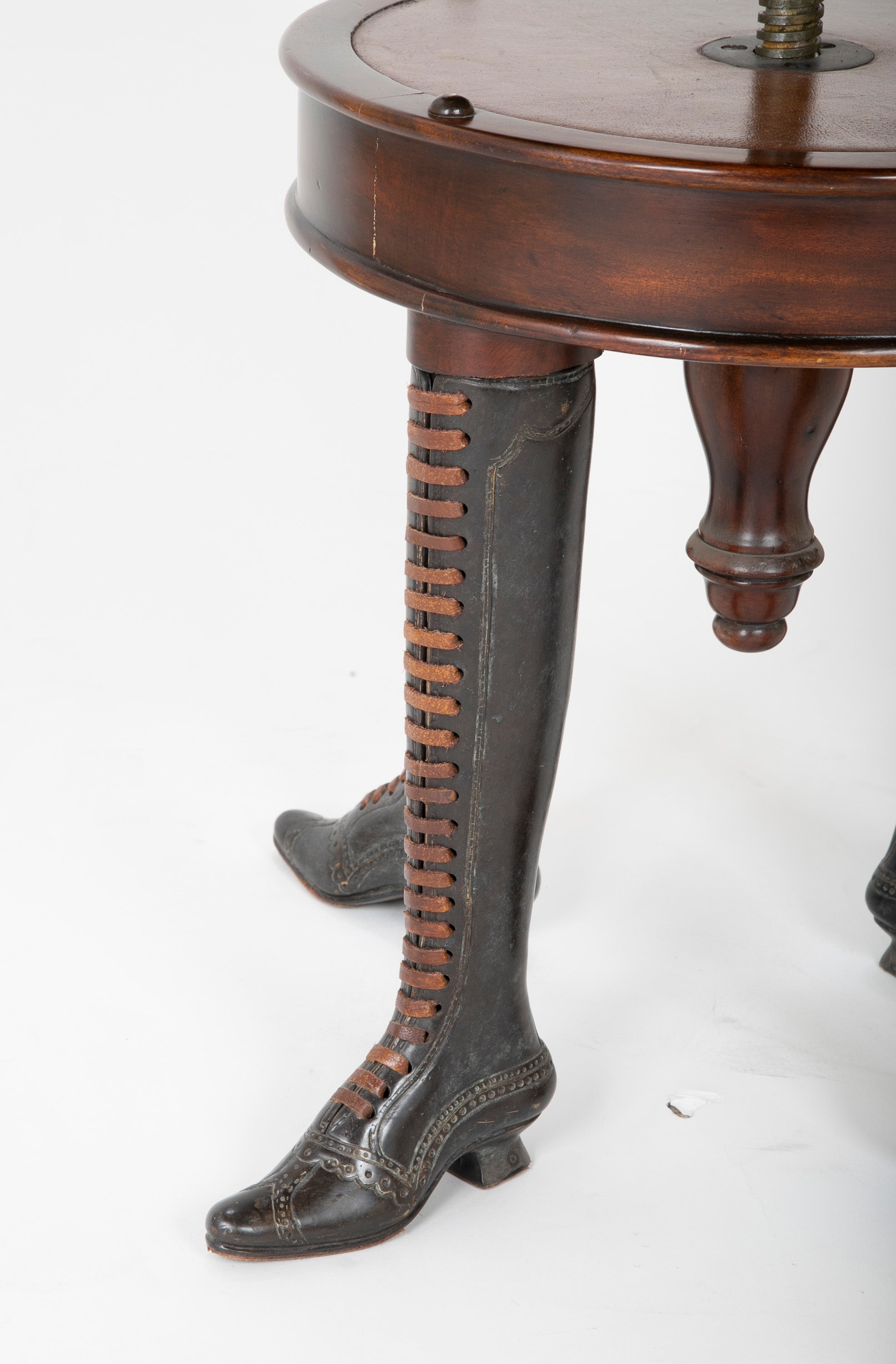 Bronze Four Legged Adjustable Revolving Stool with Leather Upholstered Seat