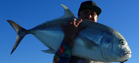 Photo of Gavin Miles with a Giant Trevally caught using an Old Dog Lures by Dave Killalea