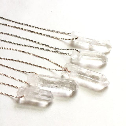 healing crystal necklaces in quartz, thin gold chain,  wild tide collective thewildtide.com