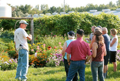 David at the south garden gate at Prairie Road Organic Seed