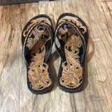 tooled leather flip flops