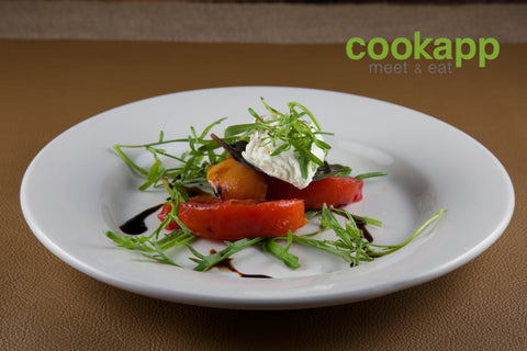 Burrata, tomatoes, peaches, and microgreens