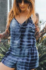 This Lydia Romper is a peasant/hippie/boho dream. Tie Dye, romper with a lace up front. What more do you need? #StitchandFeather
