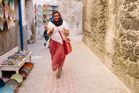 Alina Mendoza walking through Morocco for basket finds with La Basketry