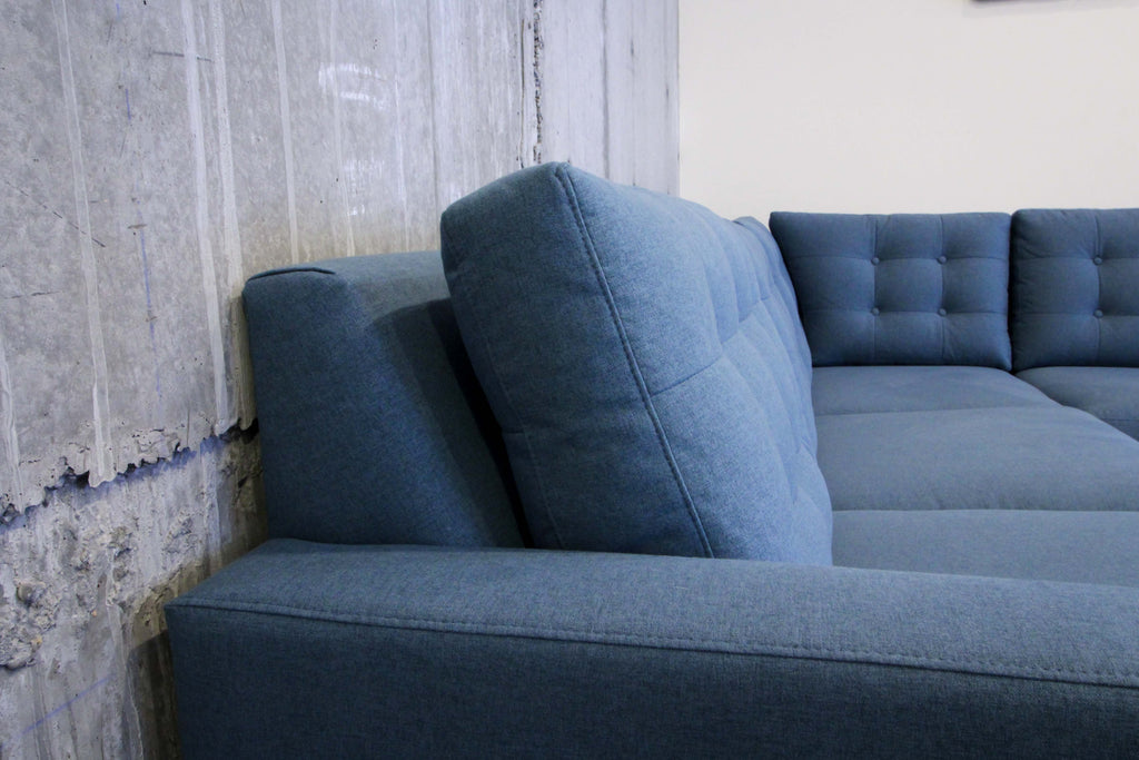 The Quinn sectional saves space by sitting flush against the wall
