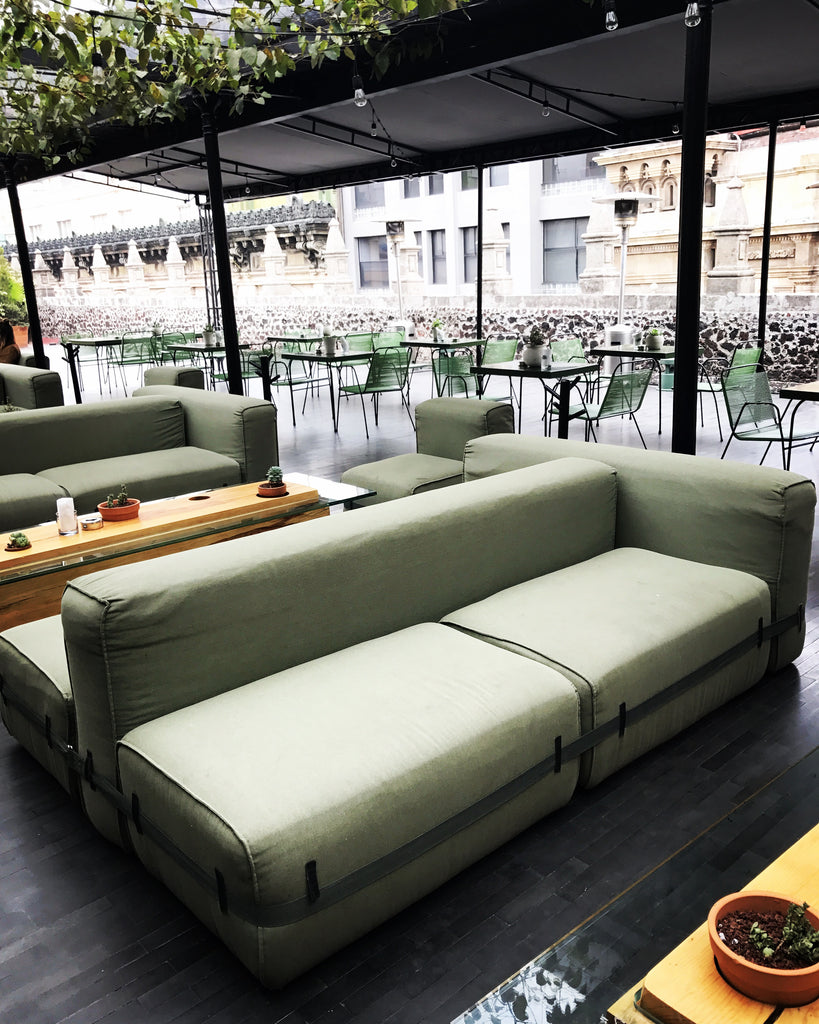 Double sided green canvas outdoor sofas at DOWNTOWN hotel in Mexico City