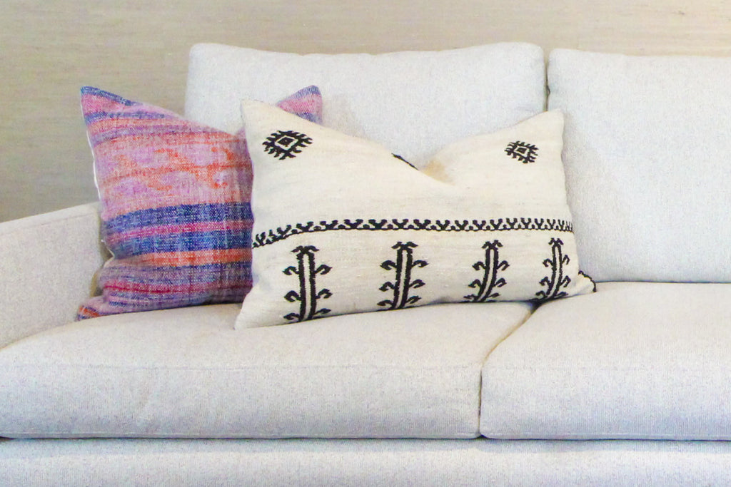 Throw pillows are an inexpensive way to add style to a sofa.