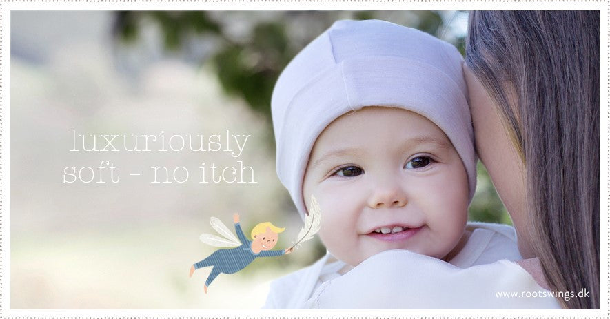 newborn baby clothing. keep baby happy in organic merino from newborn