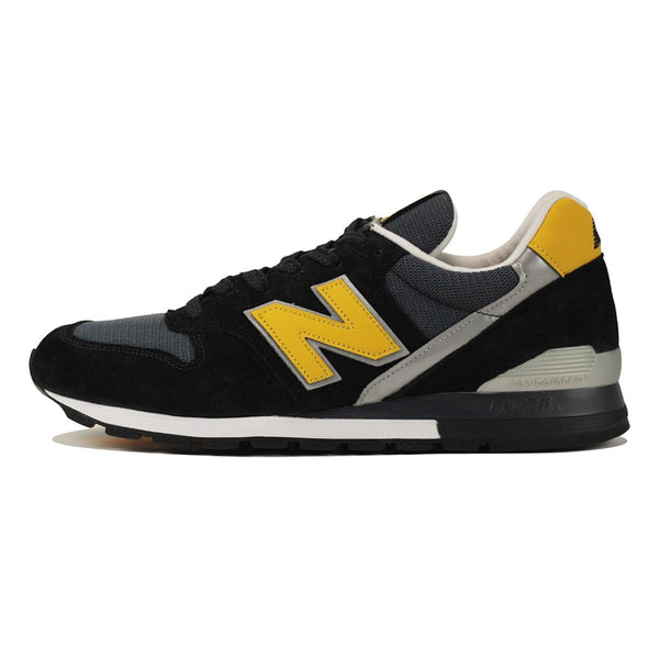 new balance black and yellow