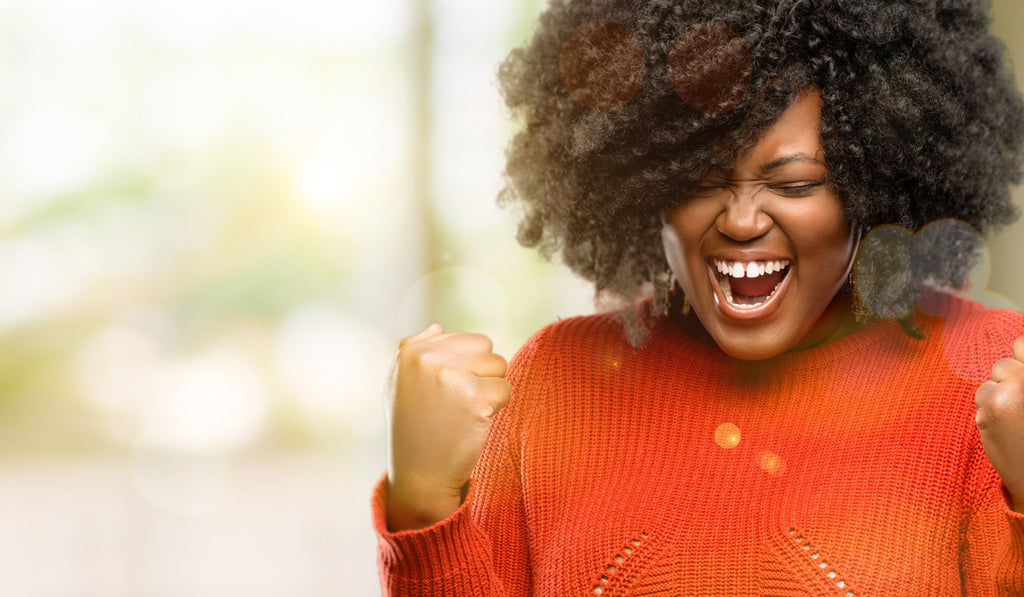 woman celebrating an accomplishment 