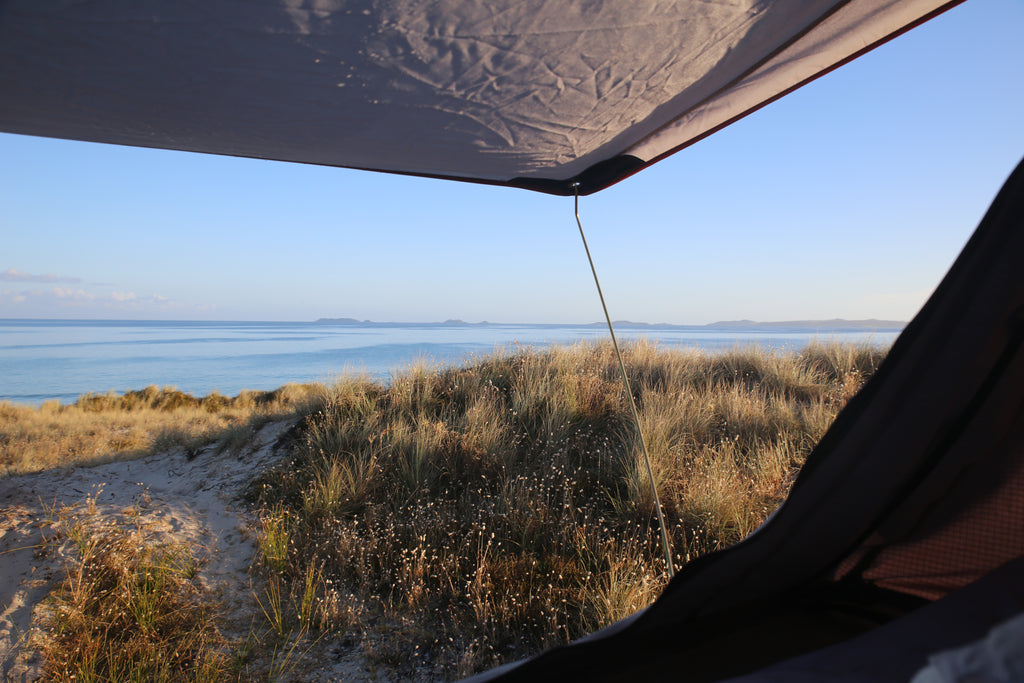 Roof top tent beach view