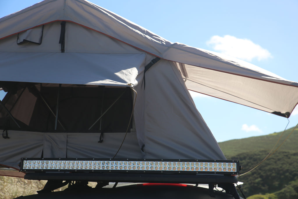 Mudstuck roof top tent and LED light bar