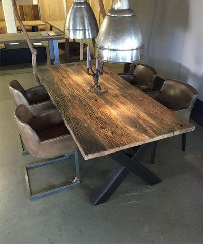 recycled dining table industrial trend reclaimed bridge timber solid wood furniture trend