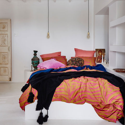 kip and co tarzan linen velvet tassle throw vavoom interiors trends bedroom