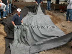 How to build a pond - install the pond liner over the underlayment