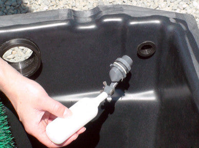 The  HydroClean pond skimmer comes standard with an auto fill valve port